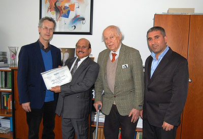 from left to right: Christian Heipke, President ISPRS, Muhamad Alrajhi, ISPRS Regional Coordinator for the Arab States, Gottfried Konency, ISPRS Honorary Member and President 1984-1988, Abdalla Alobeid, MOMRA, during a meeting in Hannover, Germany, on Feb. 24, 2017. 